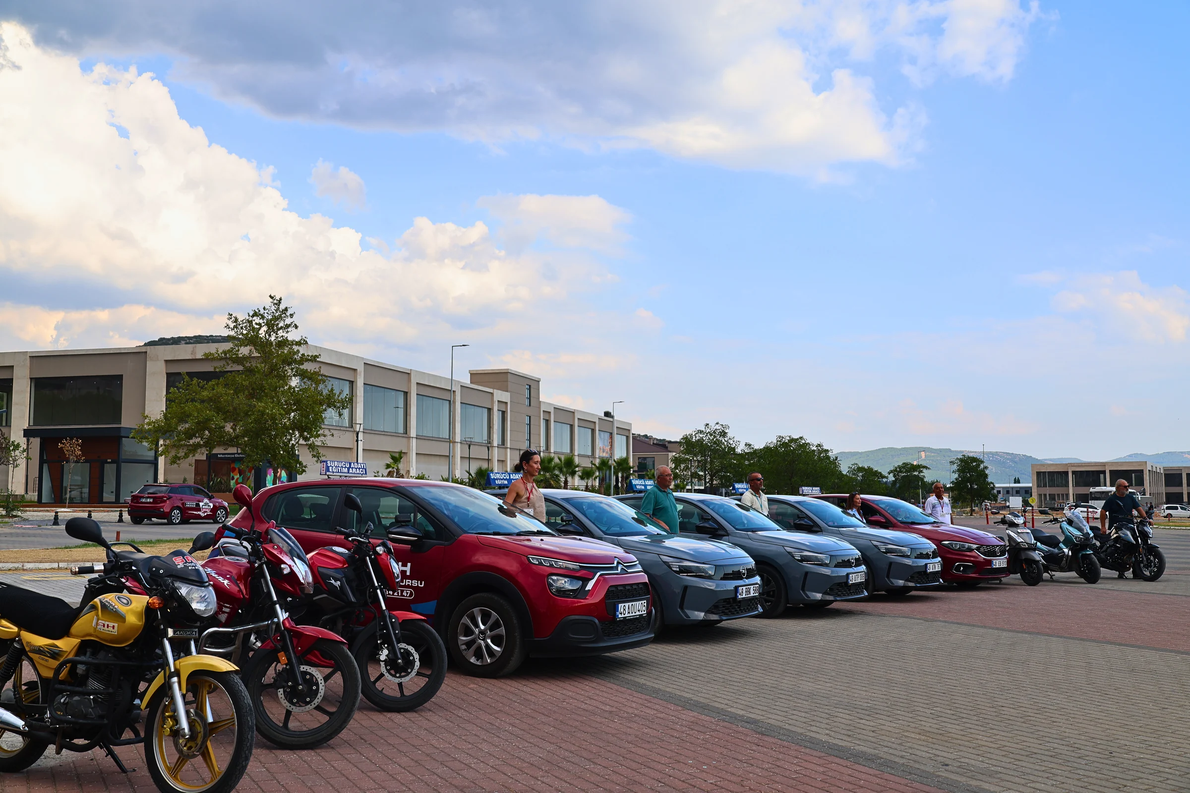The complete Şah Driving School fleet of car and motorcycle training vehicles